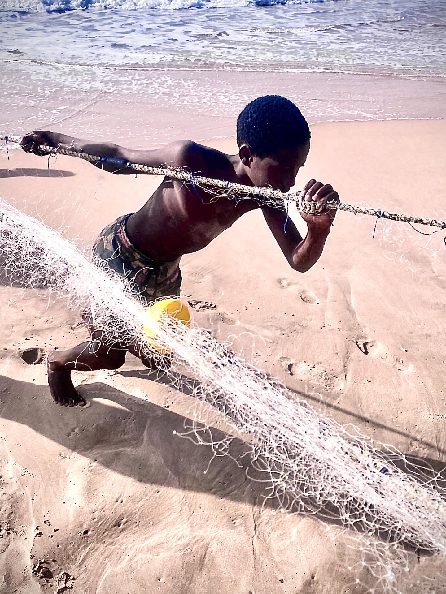 It’s a really nice experience to watch and help the fishermen. Everyone come to help. Kids and adults. Even me. 
#fishing #beach #kids #gambia #bijilo